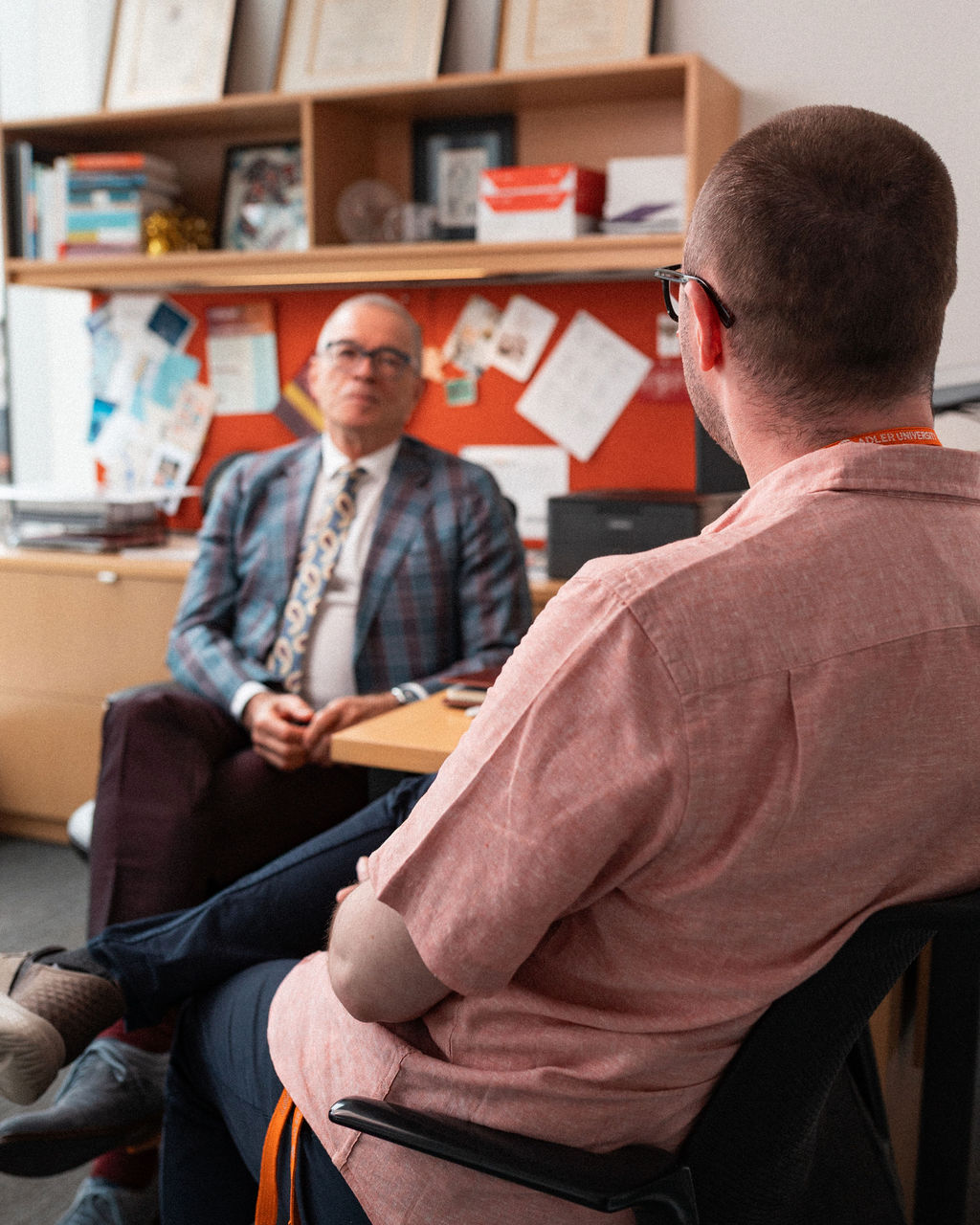 Adler University faculty members meet in an office at the Vancouver campus.