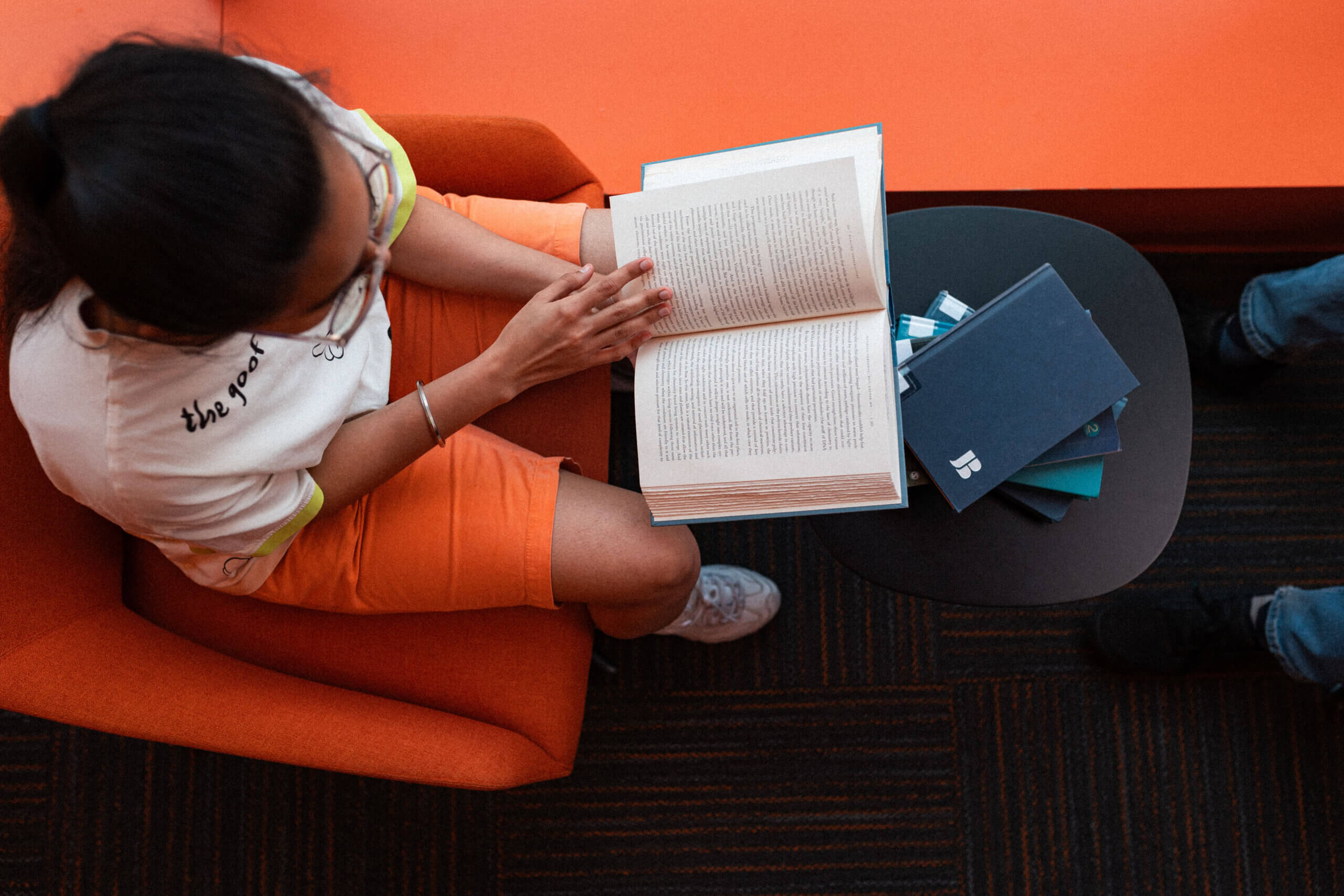 An Adler University student studies in the library of the Vancouver Campus.